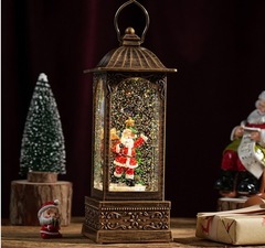 Felinar decorativ Craciun cu Mos Craciun rotativ si efect de ninsoare, lumina calda, 28 cm