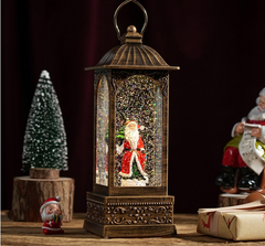 Felinar decorativ Craciun cu Mos Craciun rotativ si efect de ninsoare, lumina calda, 28 cm