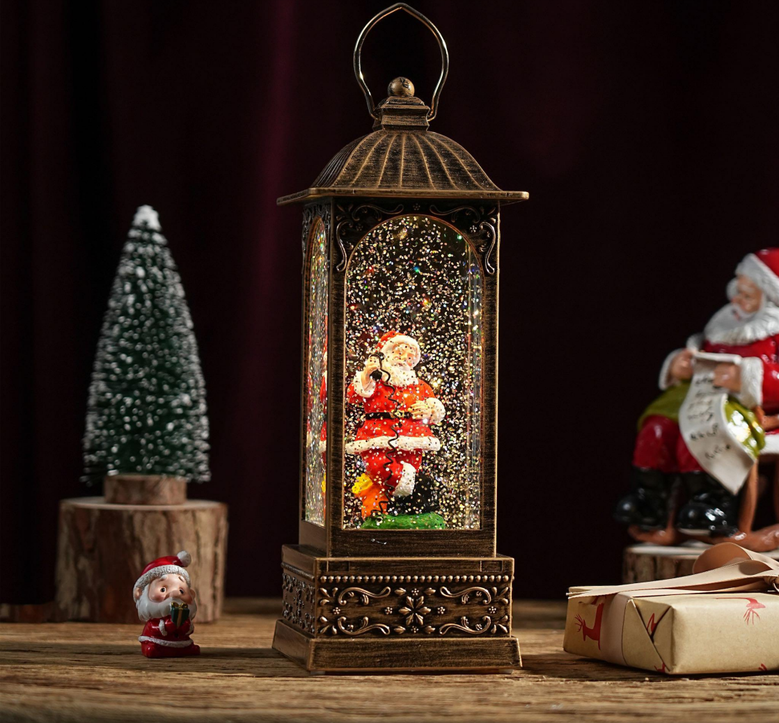 Felinar decorativ Craciun cu Mos Craciun rotativ si efect de ninsoare, lumina calda, 28 cm