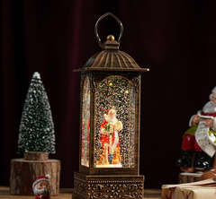 Felinar decorativ Craciun cu Mos Craciun rotativ si efect de ninsoare, lumina calda, 28 cm