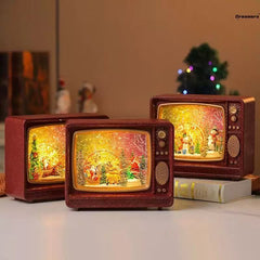 Felinar decorativ Craciun tip televizor retro cu scena fixa si efect de ninsoare, lumina calda, 25 cm