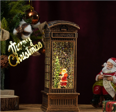 Felinar decorativ Craciun tip cabina telefonica, cu scena fixa si efect de ninsoare, lumina calda, 25 cm