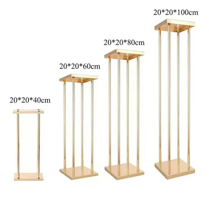 Set 4 suporturi decorative aurii tip piedestal, design modern geometric, înălțimi diferite