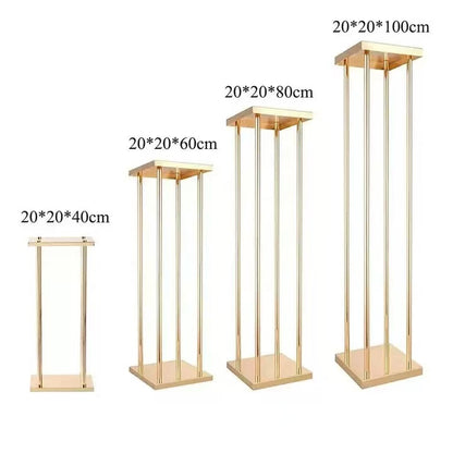 Set 4 suporturi decorative aurii tip piedestal, design modern geometric, înălțimi diferite